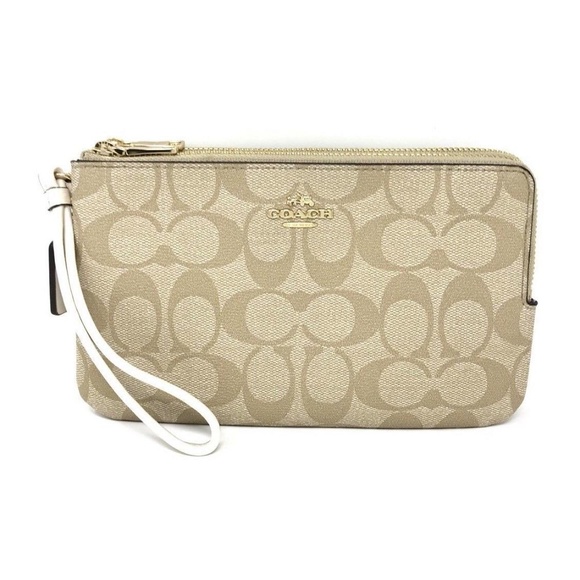Coach Handbags - Coach Signature PVC Double Zip Wallet